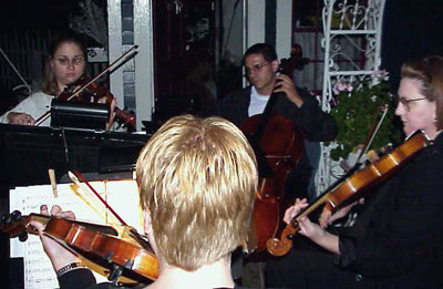 Wedding Music  String Quartet on String Quartet Provides Soft Music During A Small  Outdoor Wedding