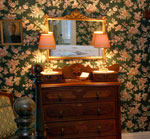 An unusual antique dresser welcomes you to the Florence Myrna Room.