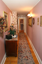 The hallway on the second floor is like a gallery of Victorian-style art.