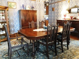 The dining room table, where breakfast is typically served at Dreams of Yesteryear.