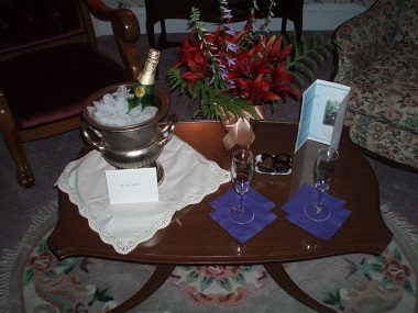 A romantic setting of flowers and champagne