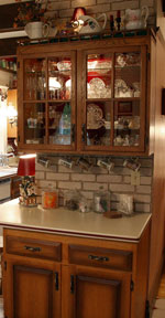 This glass-door cabinet was built by Bonnie's father.