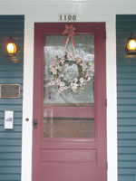 The front door of 1100 Brawley Street.