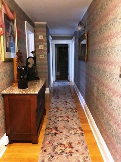 The hallway on the second floor is like a gallery of Victorian-style art.